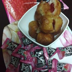 A picture of Jelly filled sweet bread roll.