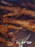 Patas de pollo con salsa