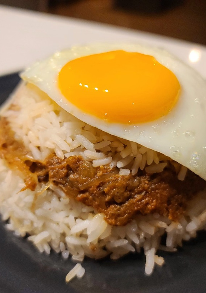 Una foto de Arroz tapado