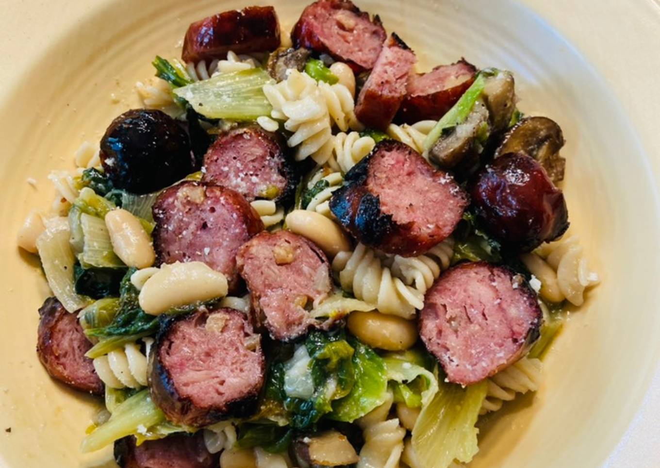 Smoked Chicken sausage, Escarole and beans over quinoa and brown rice pasta