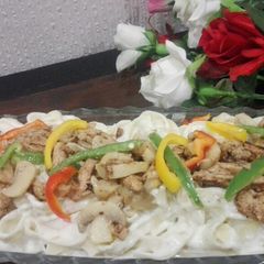 A picture of Cheesy creamy Alfredo pasta.