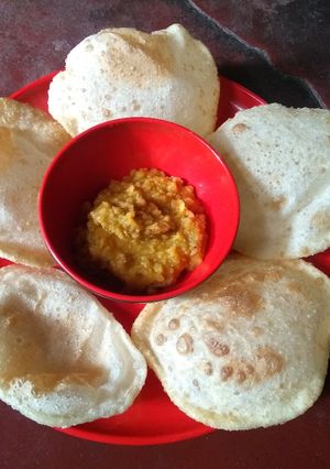 A picture of Puree and chana daal.
