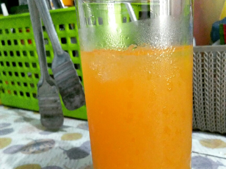 Bagaimana Membuat Es jeruk peras madu Anti Gagal