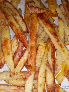 Una foto de Papas fritas al horno