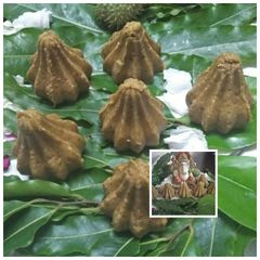 A picture of Oats and jaggery dry fruits mix Modak.