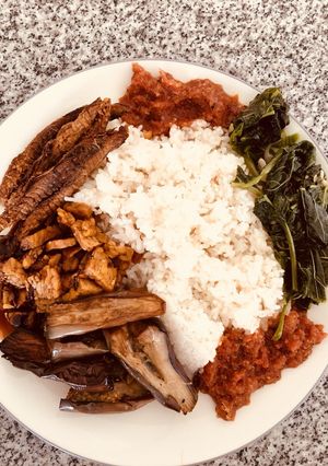 A picture of Tempe sambal fried sardines eggplant spinach.
