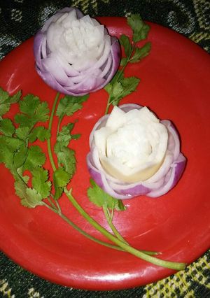 A picture of Onion and Raddish flowers salad.