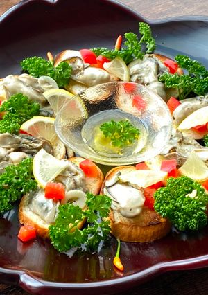 A picture of Oyster pickled in Garlic Olive Oil.