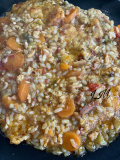 Una foto de Arroz con sabor a pizza en olla GM