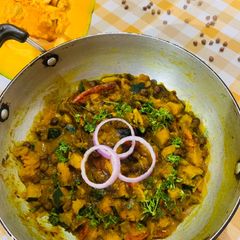 A picture of Khatta Meetha Kaddu Chana (Pumpkin and Brown chana).