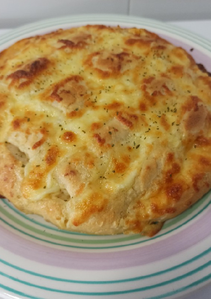 Una foto de Pan de ajo con queso