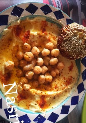 A picture of Falafel with hummus.