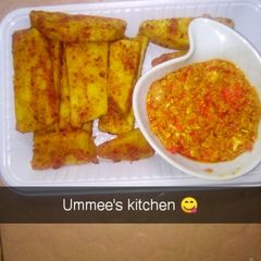 A picture of Yam yamarita with eggs sauces.