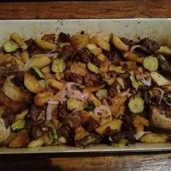 A picture of Roast beef and potatoes.