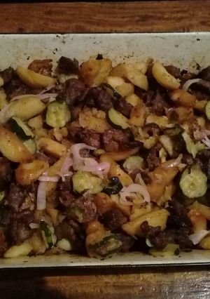 A picture of Roast beef and potatoes.