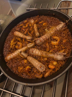 Una foto de Paella