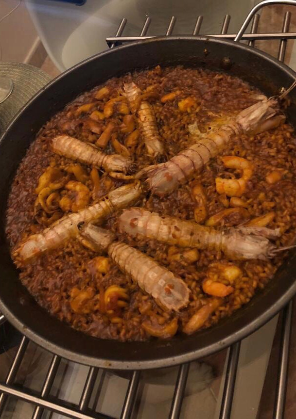 Una foto de Paella
