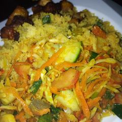 A picture of Couscous with vegetable sauce.