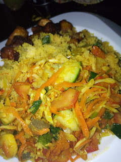 A picture of Couscous with vegetable sauce.