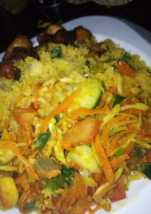 A picture of Couscous with vegetable sauce.