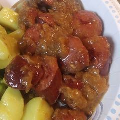 A picture of Saucisses Soubise /Sausage Cooked in onion sauce.