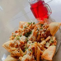 A picture of Cheese corn Samosa and masala pasta.