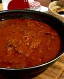 Lengua en salsa asada
