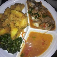 A picture of Beef and potato stew and fried veges.