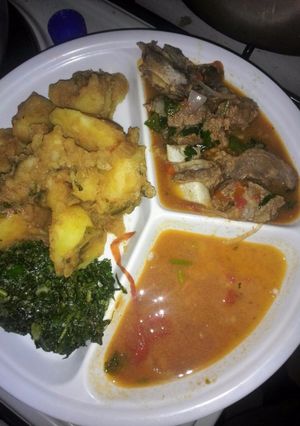 A picture of Beef and potato stew and fried veges.