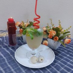 A picture of Litchi mojito mocktail / litchi squash.