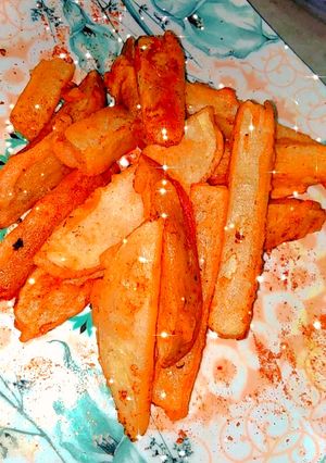 A picture of Potato wedges.
