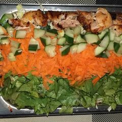 A picture of Vegetables with smoked chicken.