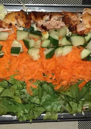 A picture of Vegetables with smoked chicken.