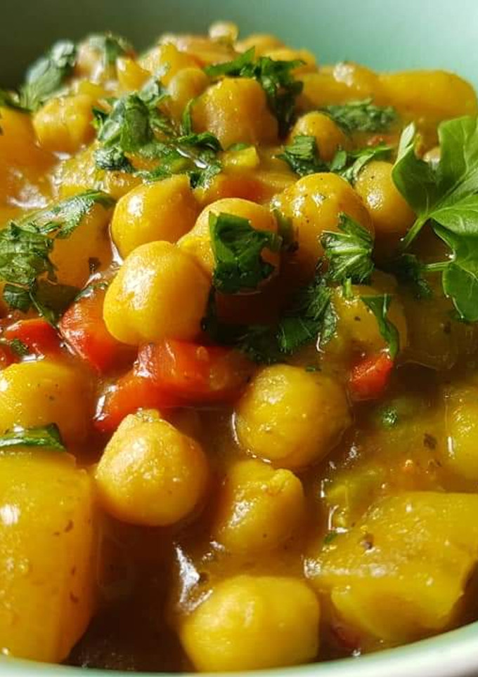 Una foto de Garbanzos al curry con leche de coco