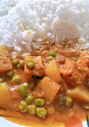A picture of Rice with Aloo matar Vegetable.
