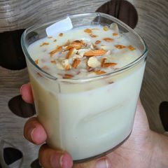 A picture of Banana Shake With Almond Topping.