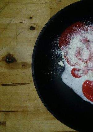 Una foto de Helado spaguettis con queso rallado y tomate