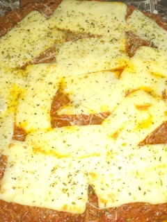 Una foto de Pizza de Muzzarella a la bolognesa🤤