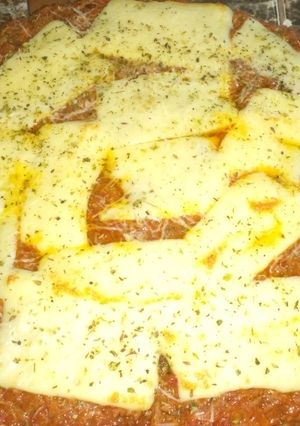Una foto de Pizza de Muzzarella a la bolognesa🤤