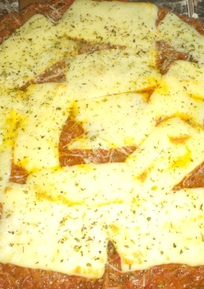 Una foto de Pizza de Muzzarella a la bolognesa🤤