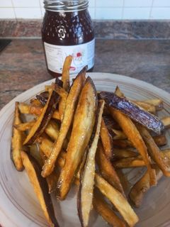 Una foto de Berenjenas fritas con miel 🍯