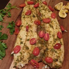 Masala snoek with roasted tomatoes A picture of Masala snoek with roasted tomatoes.