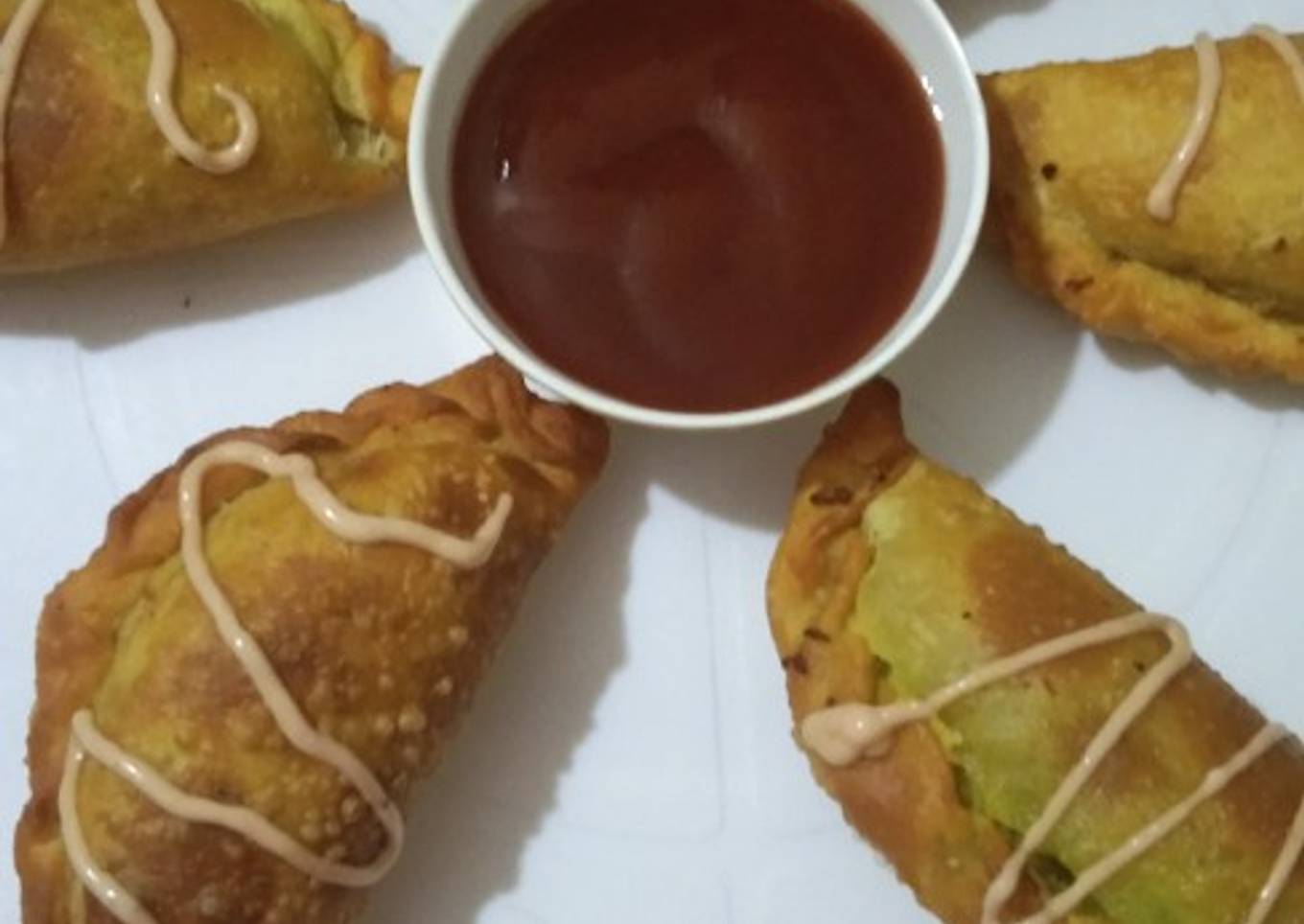 Mutter gujiya