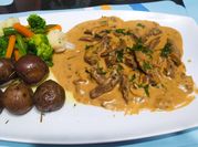 Una foto de lomo stroganoff