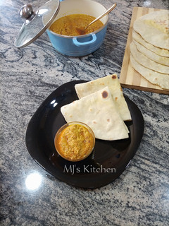 A picture of Coconut Milk Roti with Mayo cabbage beef dip.