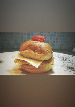 A picture of Chicken cheese burger.