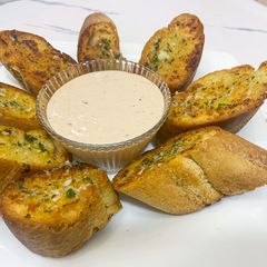 A picture of Garlic Bread and Baked Beans Dip.