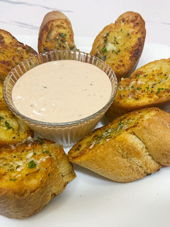 A picture of Garlic Bread and Baked Beans Dip.