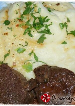 A picture of Beef with sun-dried tomatoes and red wine.