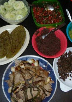 A picture of Mexican-Style Table (Grilled Meats, Nopales, Pico de Gallo...).